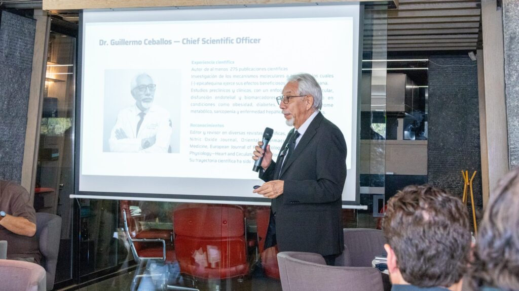 Dr. Guillermo Ceballos presenting mitochondrial health research during Mitozz Events, highlighting epicatechin science.