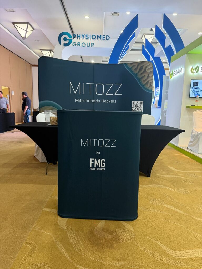 Mitozz branded exhibition stand displayed at a wellness conference as part of Mitozz Events programming.