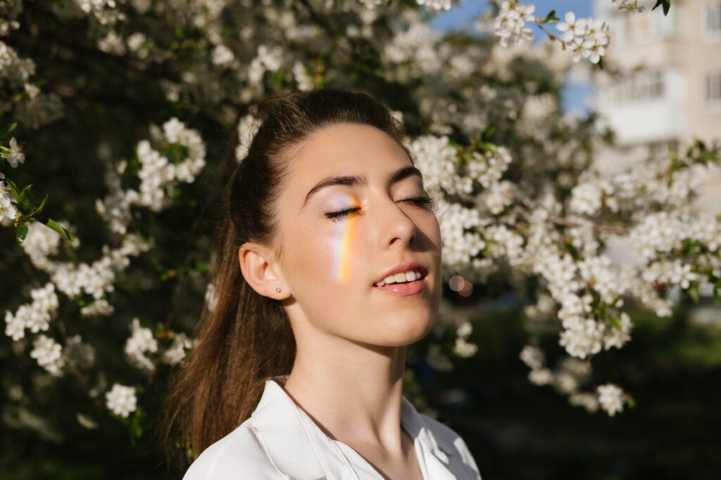 Person receiving natural sunlight to support circadian rhythm and mitochondrial energy production