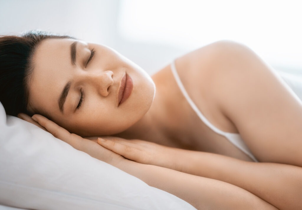 Person sleeping peacefully, illustrating how quality sleep supports arterial health by regulating inflammation, blood pressure, and metabolism.