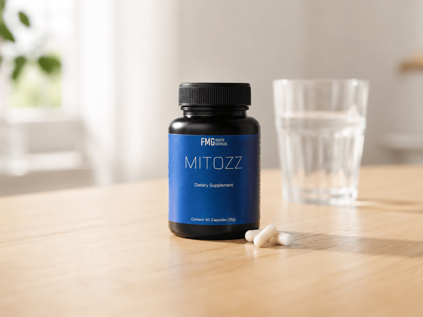 Mitozz dietary supplement bottle with capsules on a wooden table beside a glass of water.